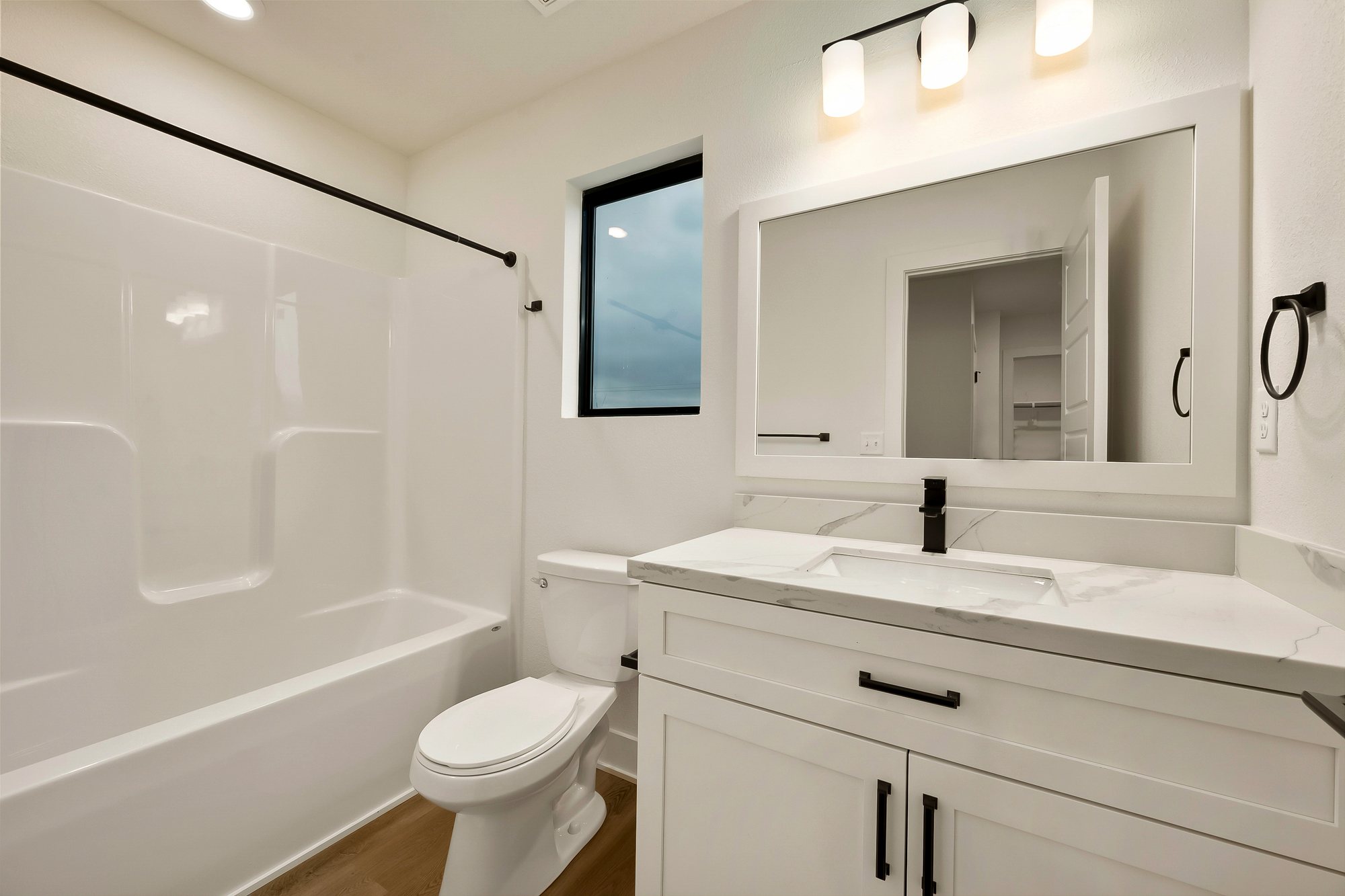 Ayden Place — bath with tub surround and vanity